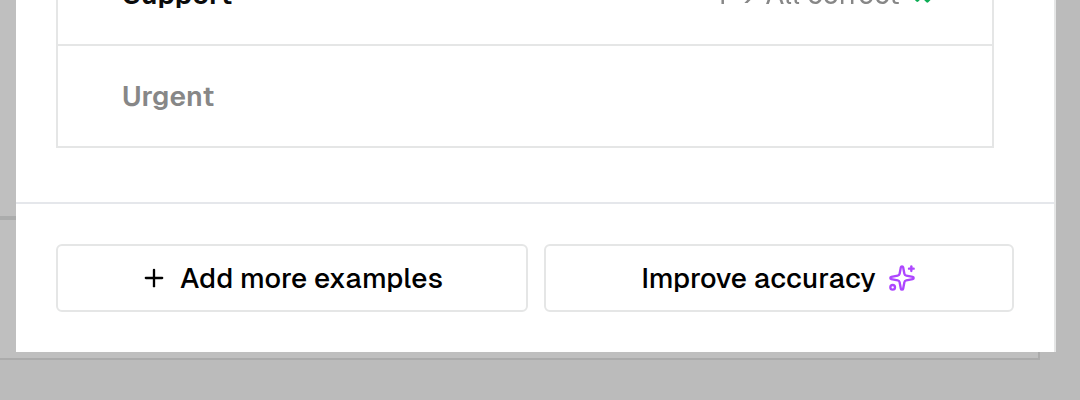 The bottom of the Model accuracy panel with the Add more examples and Improve accuracy buttons side by side